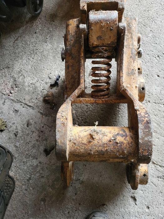 Механичен бързосменник за комбиниран багер CASE/NEW HOLLAND