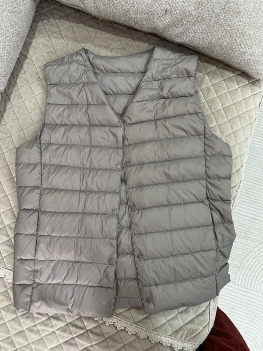 Продам женскую жилетку