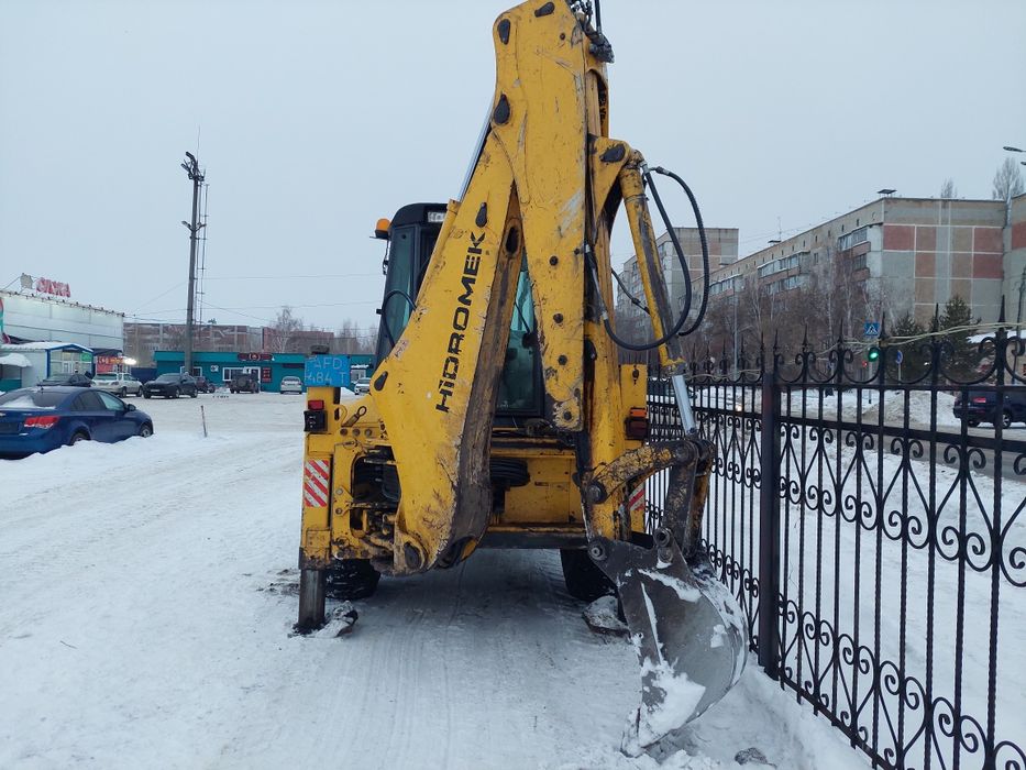 Уборка, чистка снега трактором