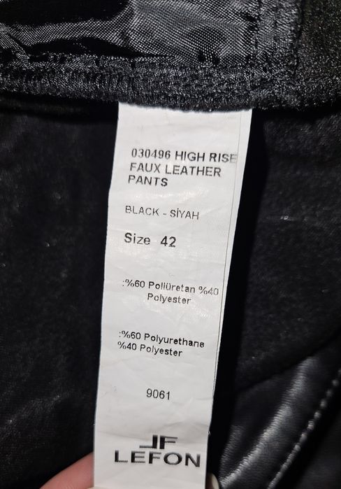 Кожаные брюки 42 размера