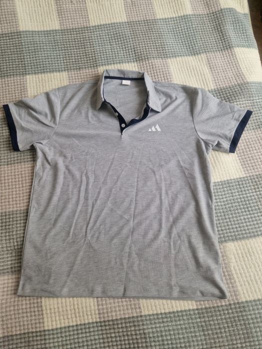 Продам футболку новую