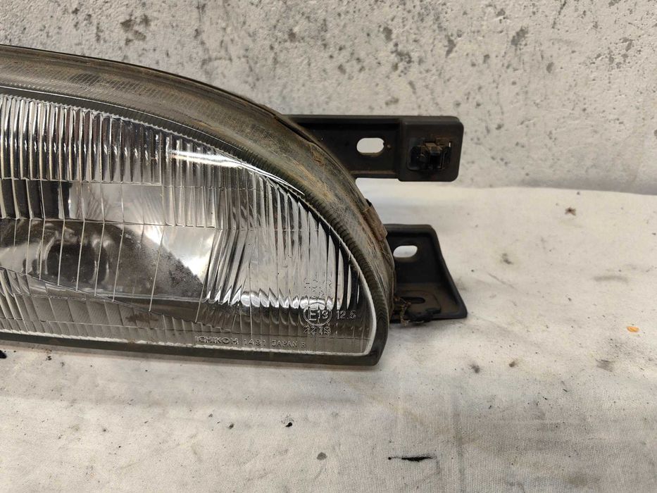 Оригинален фар Субару  Subaru Impreza 92-01
