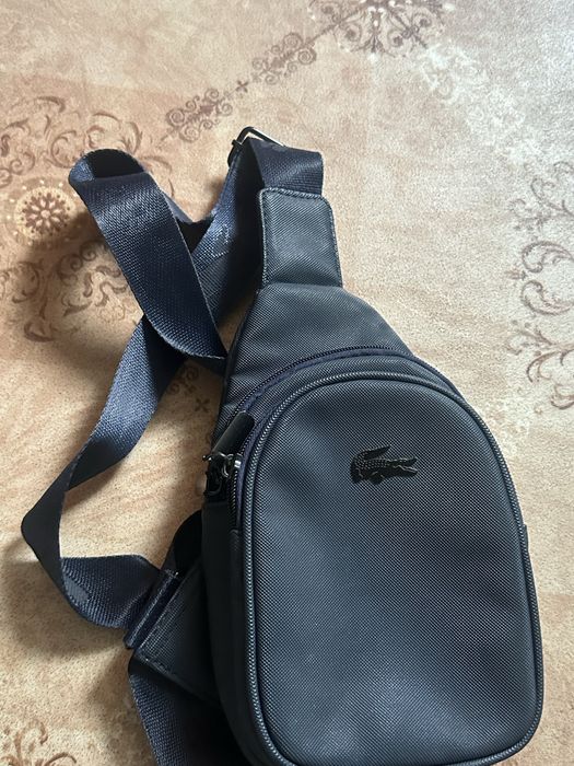 Продам барсетку Lacoste