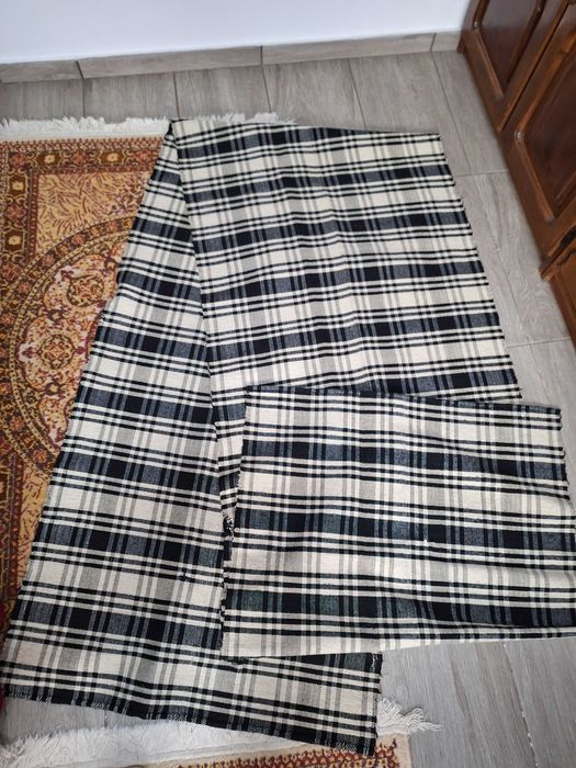 Covoar vechi de tip traversă