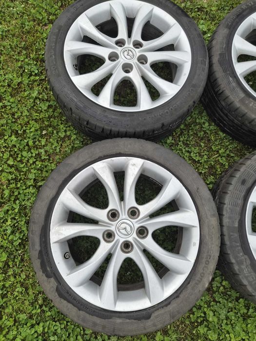 Set 4 jante originale Mazda R17 + anvelope Continental