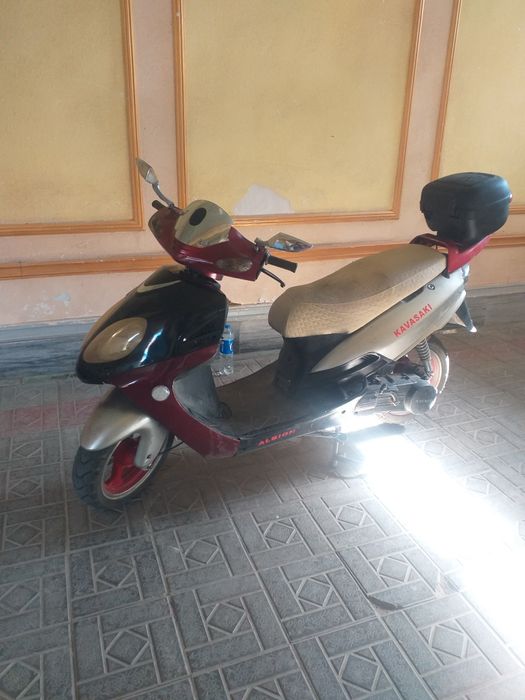 Скутер.. Kavasaki