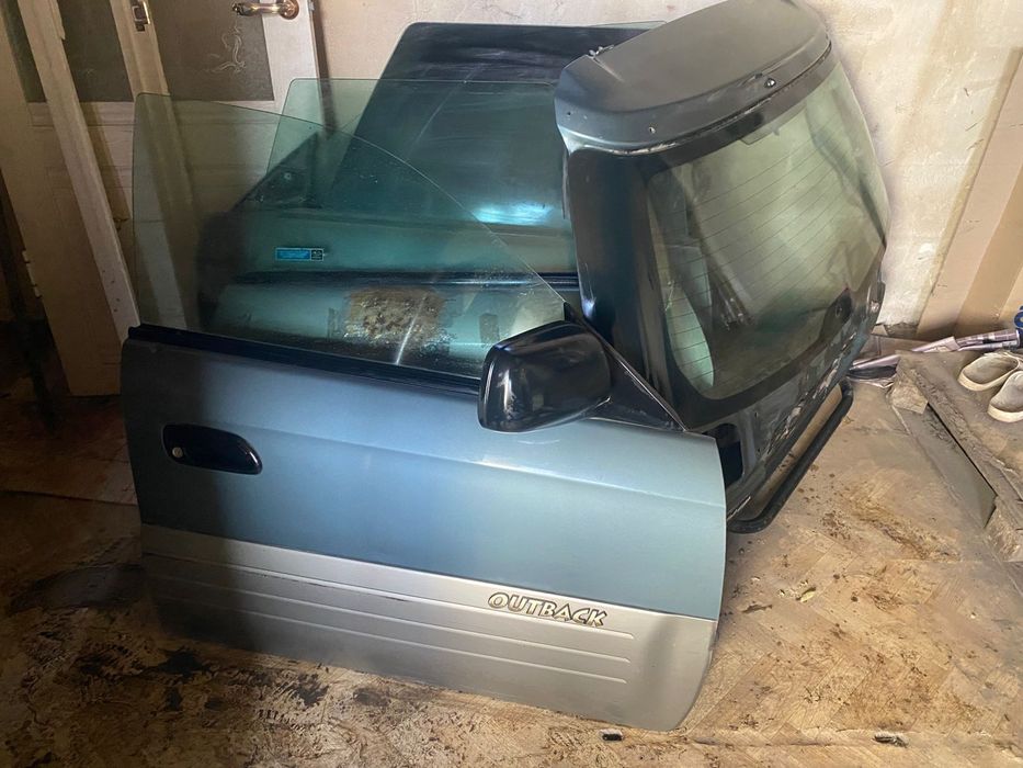 Двери Subaru outback 2003