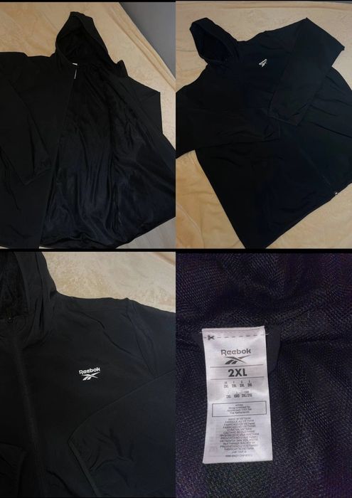Jachetă sport Reebok, mărimea XXL, nouă, neagră.
