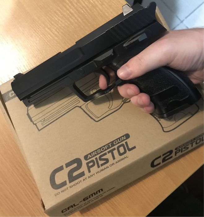 Детский игрушечный пистолет C2