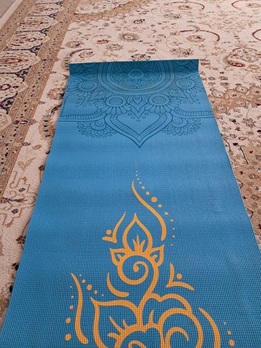 Коврик для занятий йогой.