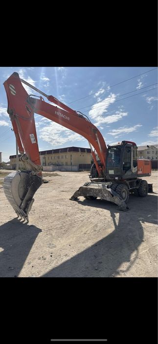 Аренда экскаватора колесный