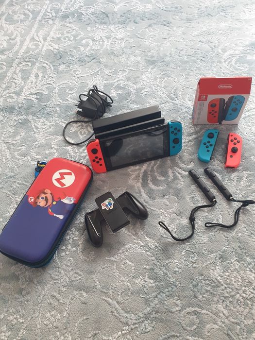 Nintendo Switch 1 pachet complet și extra joy cons