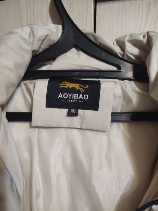 Пуховик  зима ..