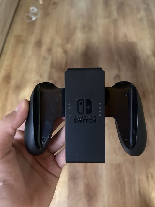 Nintendo Switch OLED + 2 jocuri + cutie + accesorii