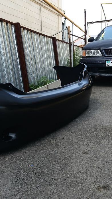 Бампер Toyota corrola E140.150