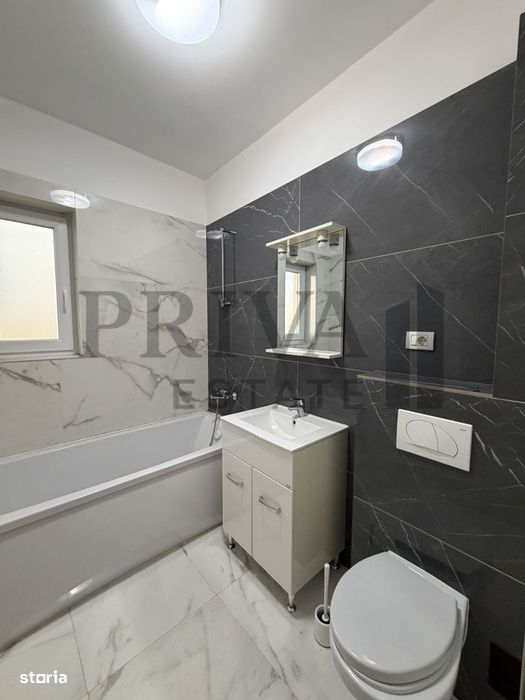 Apartament 2 camere parter balcon+curte