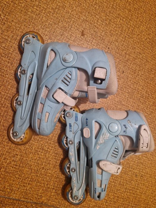 Роликовые коньки