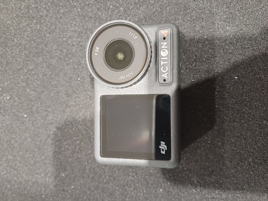Camera DJI , Action 4 cu carcasa de protectie  , ca noua