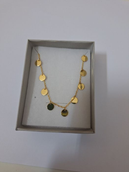 Vând un superb lănț  ișor din aur de 14 karate