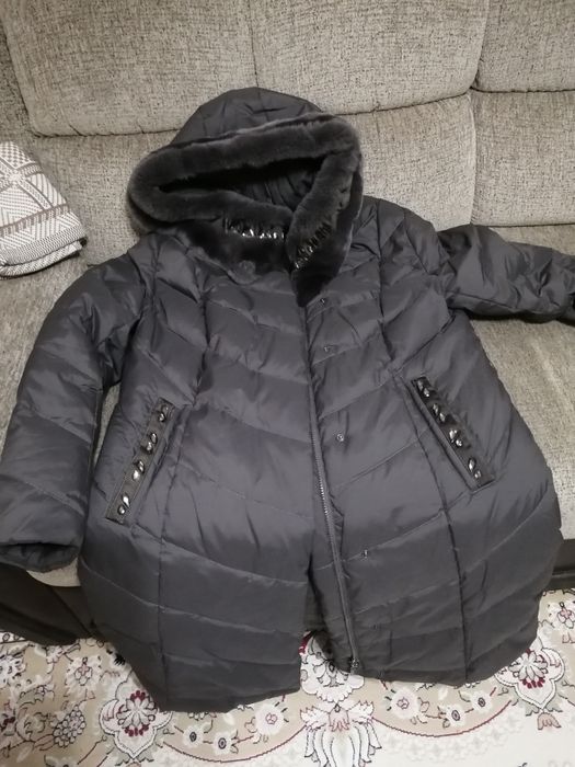 Продам пуховик женский