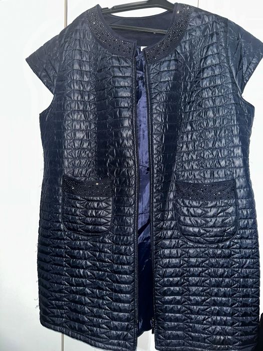 Продам желетку 56р