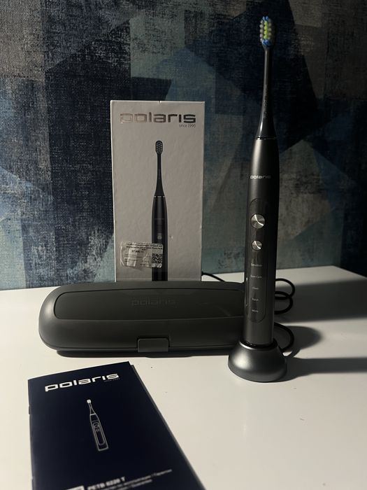 Электрическая щетка