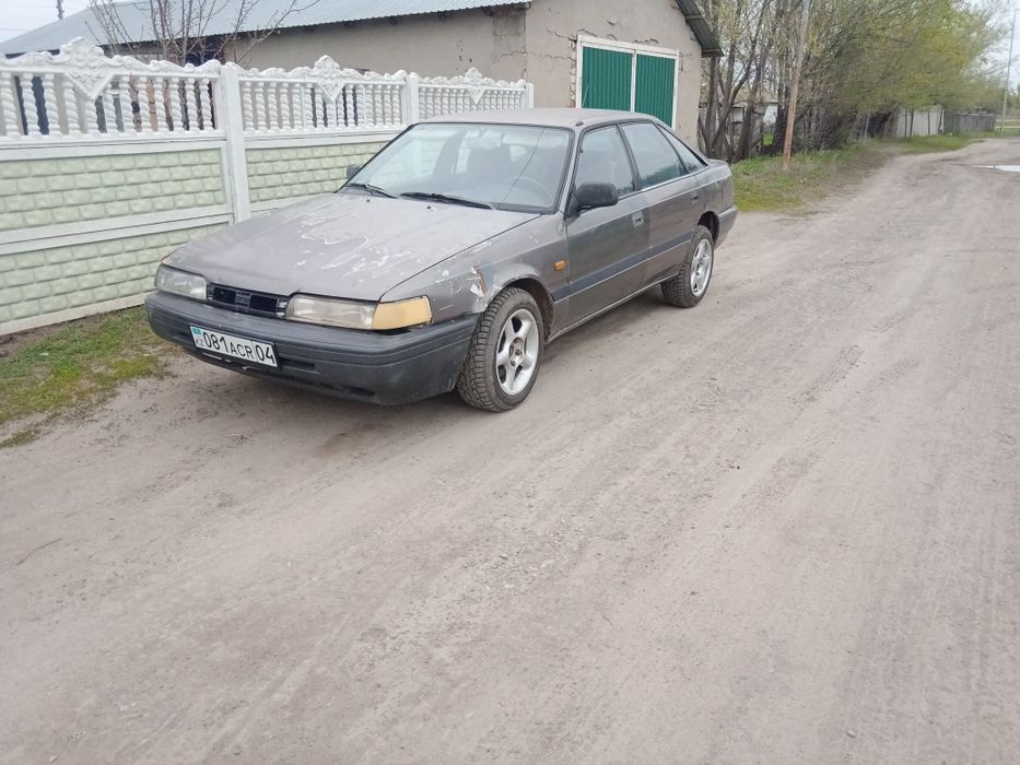 Мазда 626 gd  на полном ходу