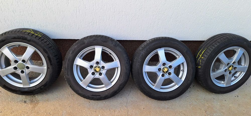 Jante aliaj Skoda Fabia2/Polo/Seat Ibiza 5x100-14"- 5½Jx14H2 +anvelope Dunlop Sport Bluresponse 185/60R14 82H DOT2024+21 Prezoane M14 F1,5 25MM CONICE