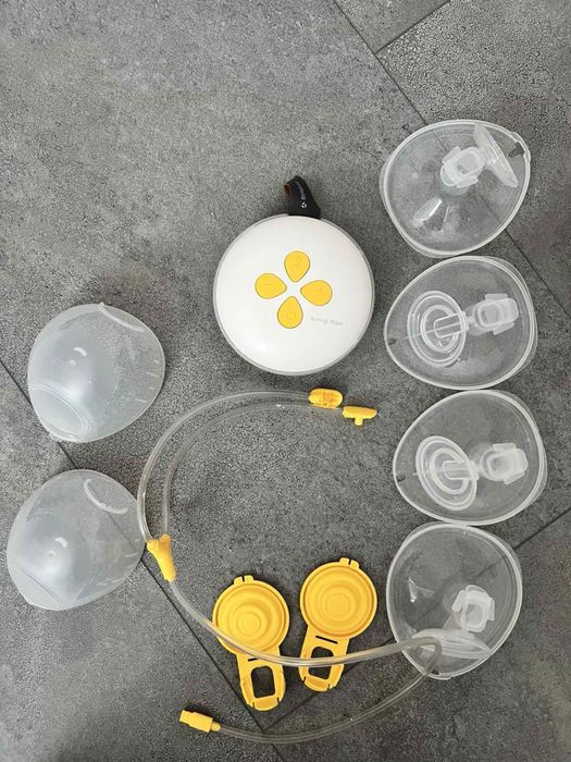 Помпа за кърмене. Модел medela swing maxi