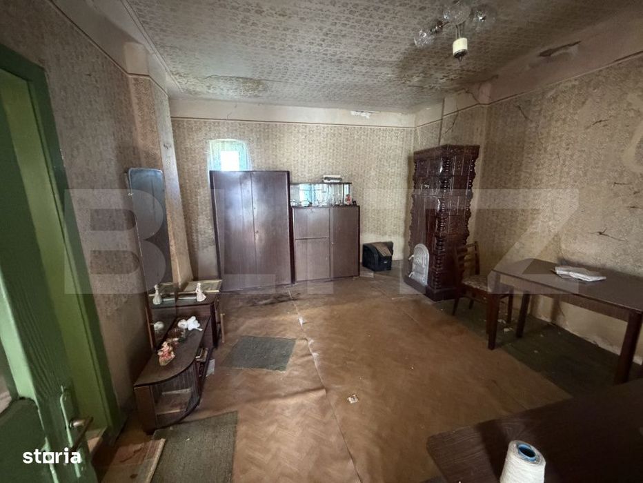 Casa cu 3 camere si un teren in suprafata de 1900 mp
