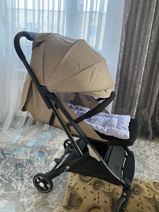 Детская коляска и стульчик
