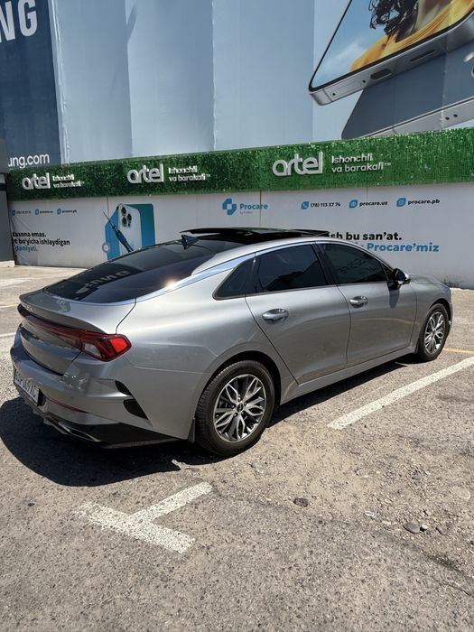 Kia K5 panarama mokriy