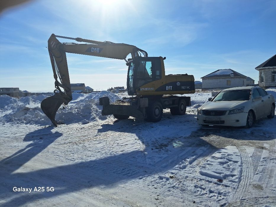 ЭКСКАВАТОР . Услуги колесного экскаватора
