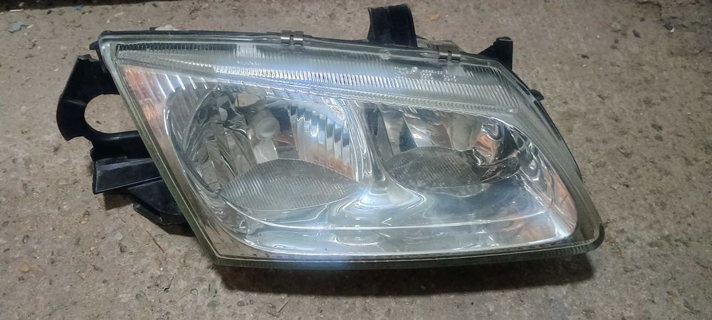 фар за нисан алмера 2000-2002г.