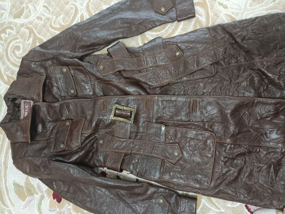 Кожанный плащь 44 р. Новый.