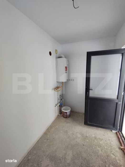 Casa finisata la cheie racordata la toate utilitatile in Santandrei