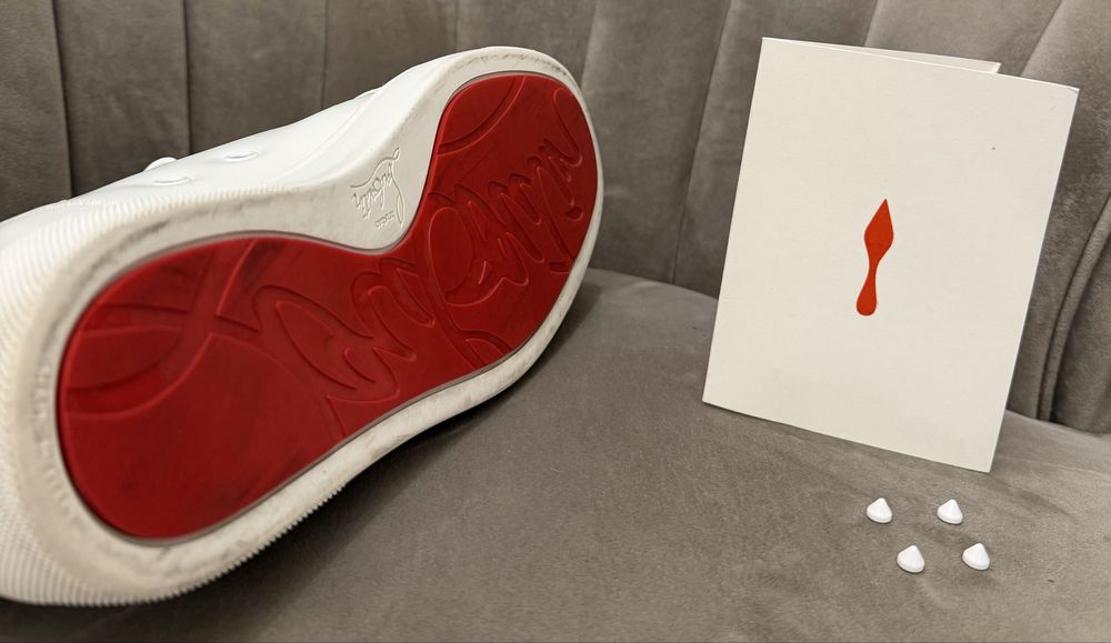 CHRISTIAN LOUBOUTIN Louis junior spike leather low trainers