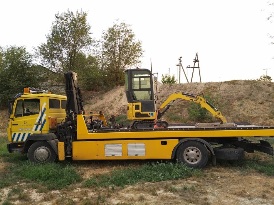 Эвакуатор,. Манипулятор сиежающий платформе..