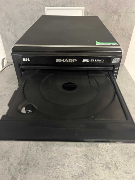 Sharp XL-UH220H micro hi-fi system with a 5-disc CD changer, FM/AM tuner, USB playback, and auxiliary input