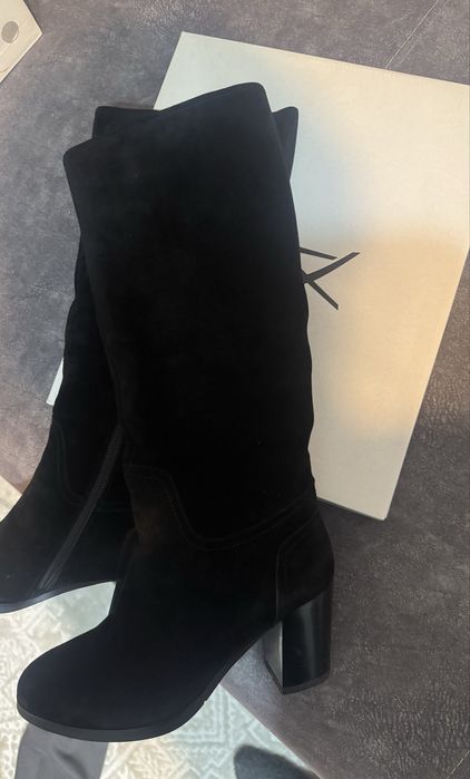 Сапоги очень теплые, удобный каблук