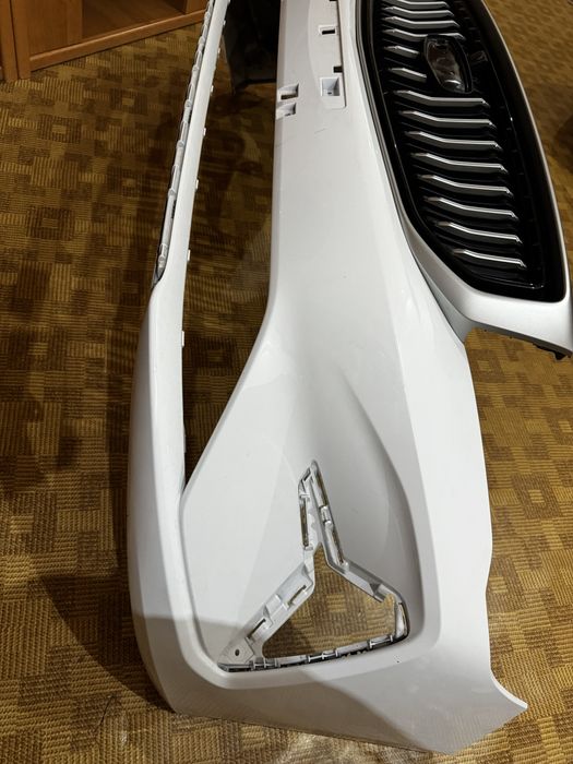 Передний бампер  на Geely Emgrand