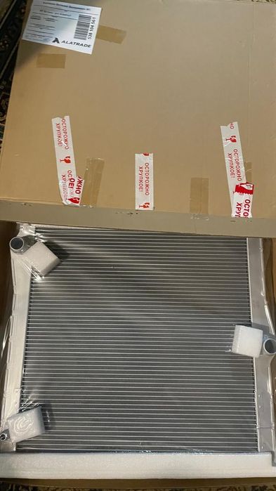 Радиатор BMW E70