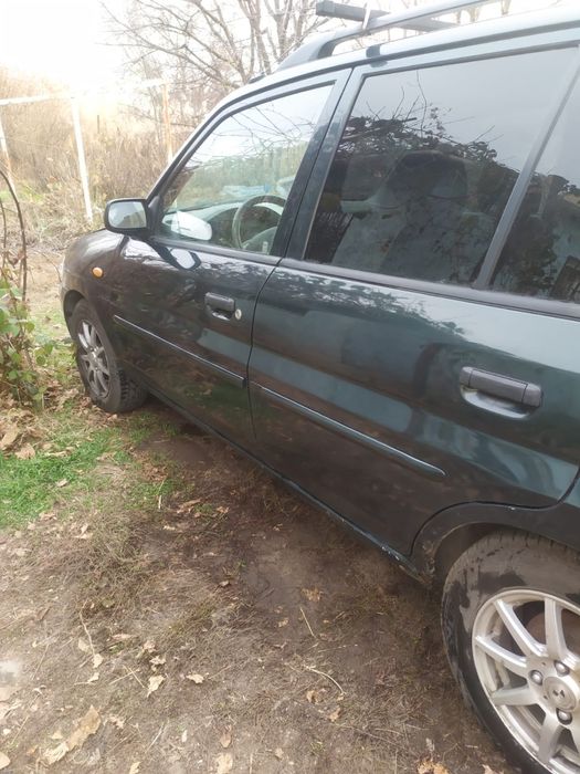 Продам машину Mazda Demio