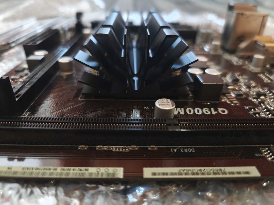Материнская плата ASRock Q1900M
