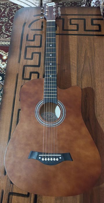 Gitara yangi sumkasi bilan