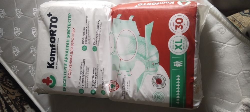 Продам памперсыXL