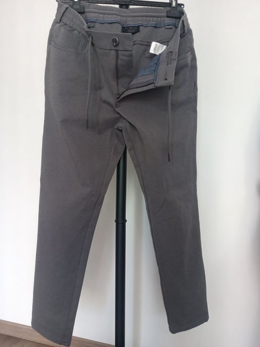 Vând pantaloni casual gri elastici