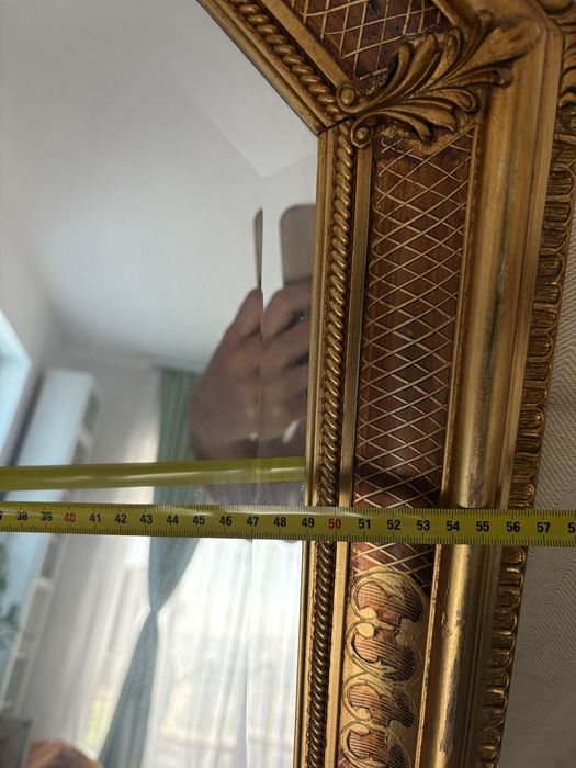 Oglinda de perete octogonala, rama aurie lemn/rasina