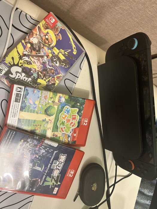 Nintendo switch 2 с картриджами и чехлом