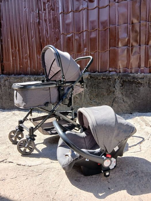 Продам универсальную  коляску 3 в 1